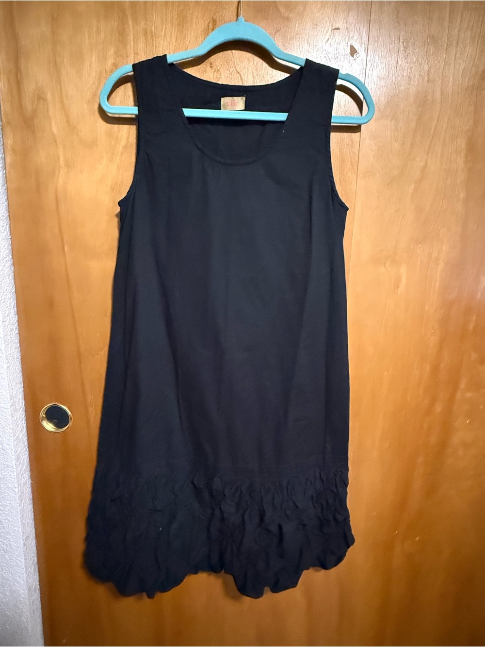 Sleeveless Black Midi Dress with Ruffle Hem